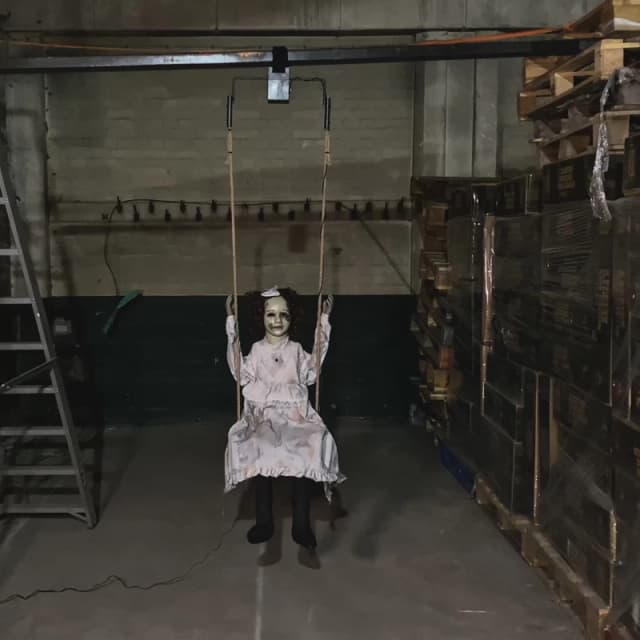 5.5ft Motion Activated Animated Swinging Decrepit Halloween Doll with LEDs