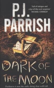 Dark of the Moon by Pj Parrish Paperback