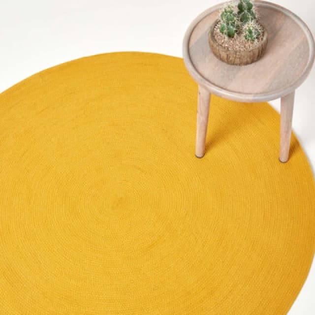 HOMESCAPES Homescapes - Mustard Yellow Handmade Woven Braided Round Rug, 120cm RU1335C
