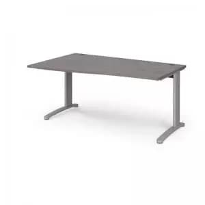 TR10 left hand wave desk 1600mm - silver frame and grey oak top