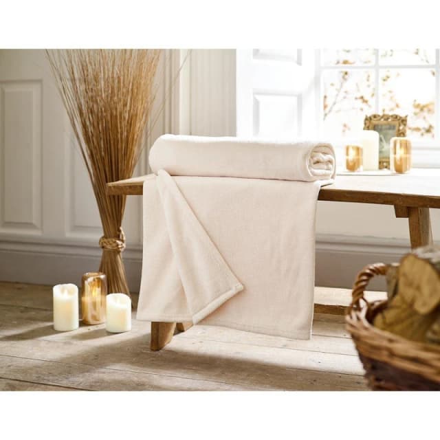 Deyongs Deyongs Snuggle Touch Super Soft Solid Colour Fleece Throw in Ivory Size: 140cm x 180cm Ivory 140cm x 180cm Unisex 5054990142511