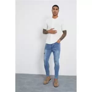 I Saw It First Mid Wash Rip & Repair Patch Skinny Jeans - Blue
