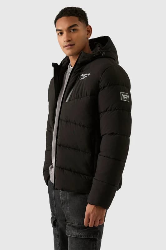 Reebok Men Stretch Puffer Jacket in Black Size: X-Large Black XL Male 5063347795928