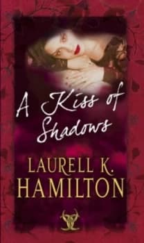 A Kiss of Shadows by Laurell K Hamilton Paperback