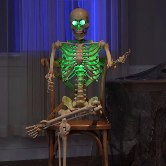 5ft (152cm) Battery Powered Light up Halloween Skeleton with Poseable Joints & Green LEDs