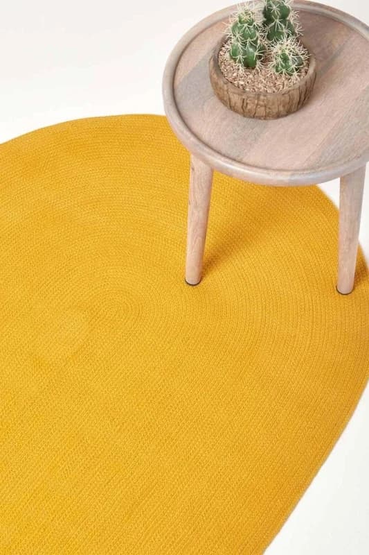 HOMESCAPES Homescapes - Mustard Yellow Handmade Woven Braided Round Rug, 150cm RU1335D