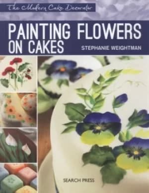Painting flowers on cakes by Stephanie Weightman