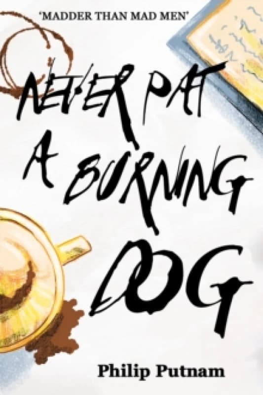 Never Pat a Burning Dog. Paperback. By Philip Putnam Books