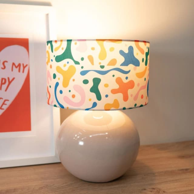 ValueLights Bosco Natural Stone Globe Ceramic Table Lamp with Abstract Shapes Lamp Shade Multi