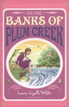 On the Banks of Plum Creek by Laura Ingalls Wilder Paperback