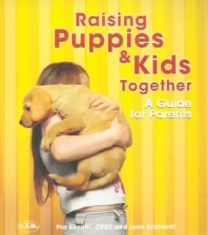 Raising puppies & kids together - Pia Silvani - Paperback - Used
