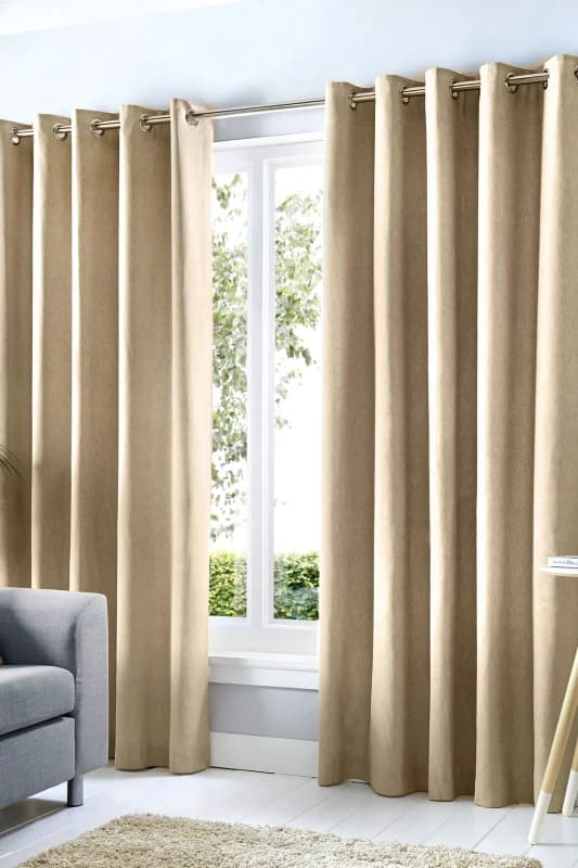 Fusion 'Cannes' 100% Cotton Black Out Plain Dyed Eyelet Curtains in Natural Size: 117cm width x 183cm drop Natural Unisex 117cm width x 183cm dr