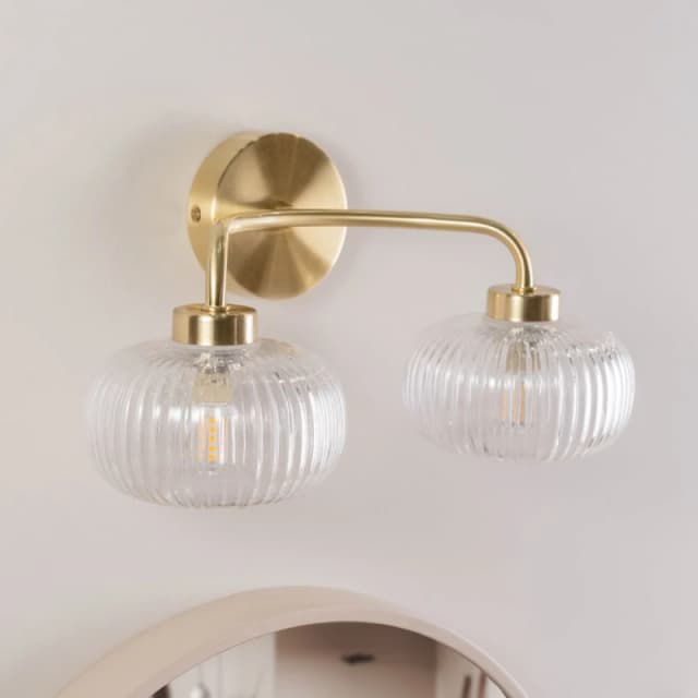 ValueLights Amaia Pair of Brushed Gold IP44 Rated 2 Way Clear Ribbed Glass Wall Lights Gold