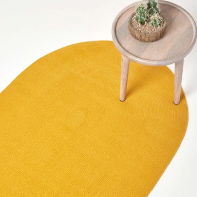 Homescapes Handmade Woven Braided Oval Rug Mustard
