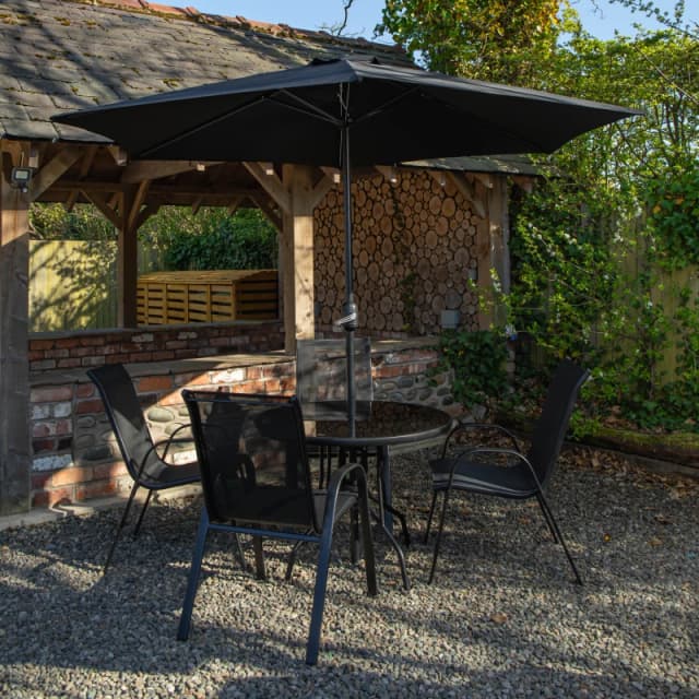 Outdoor 4 Person Round Glass Top Garden Dining Table Chairs With Black Parasol and Base Set