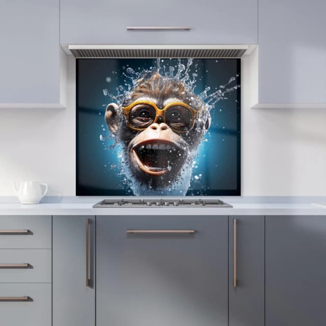 Warren Reed - Designer Splashart Cheeky Chimp Face With Glasses Kitchen Splashback in Blue Size: 900mm x 750mm Blue Unisex 900mm x 750mm