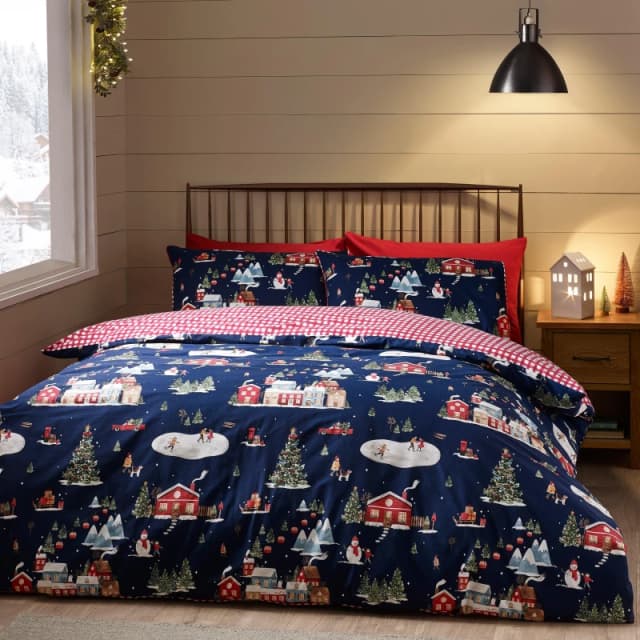 Catherine Lansfield Catherine Lansfield 'Christmas Ski Village' Reversible Duvet Cover Set in Blue Size: King Blue King Unisex 5057681186504
