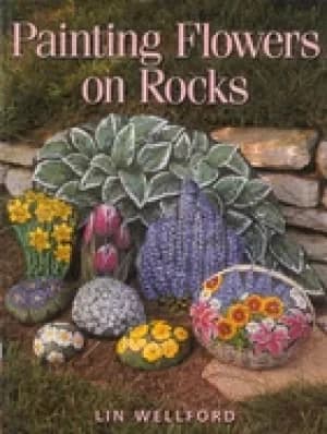 painting flowers on rocks