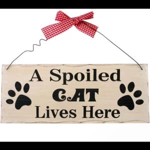 A Spoiled Cat Hanging Sign
