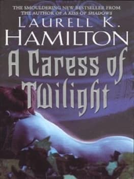 A Caress of Twilight by Laurell K Hamilton Paperback