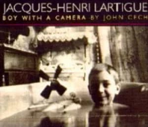 Boy with a camera by John Cech