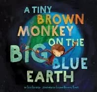 tiny brown monkey on the big blue earth