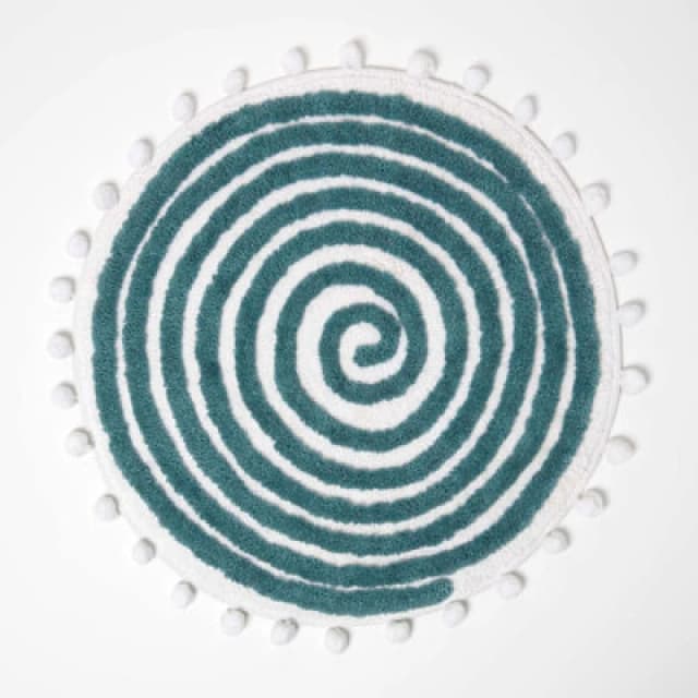 Homescapes Spiral Teal Cotton Bath Mat With Pom Pom Edges